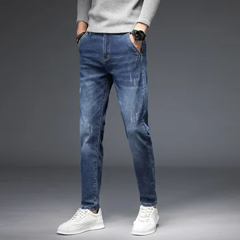 Бесплатная доставка 2023 Мужские Four Seasons, новые прямые джинсы, молодежные стрейчевые повседневные брюки средней талии